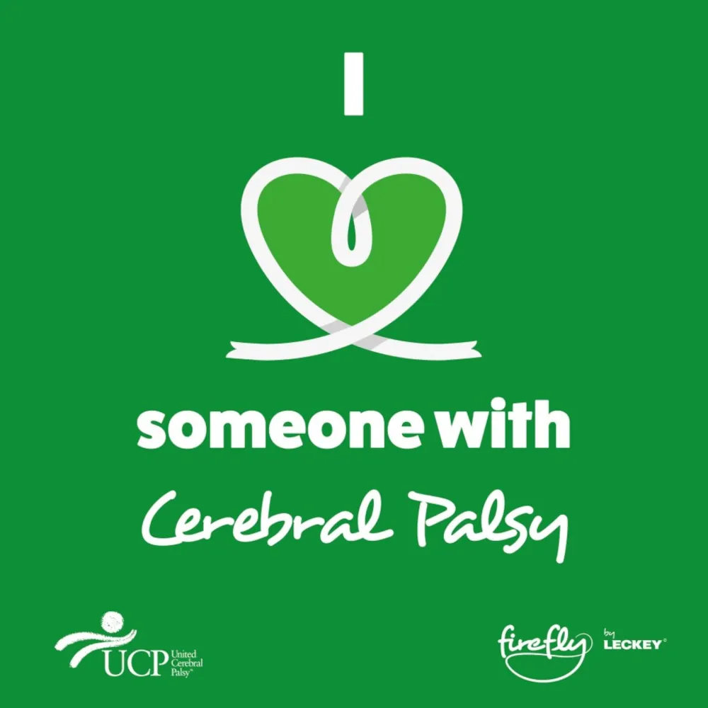 A green Cerebral Palsy Awareness Month poster shows a large white “I” next to a heart‑shaped ribbon graphic, forming the phrase “I love someone with Cerebral Palsy.” The design is simple and centered on a solid green background, with the UCP United Cerebral Palsy logo in the lower left and the firefly by LECKEY logo in the lower right. The overall message expresses support, pride, and connection.